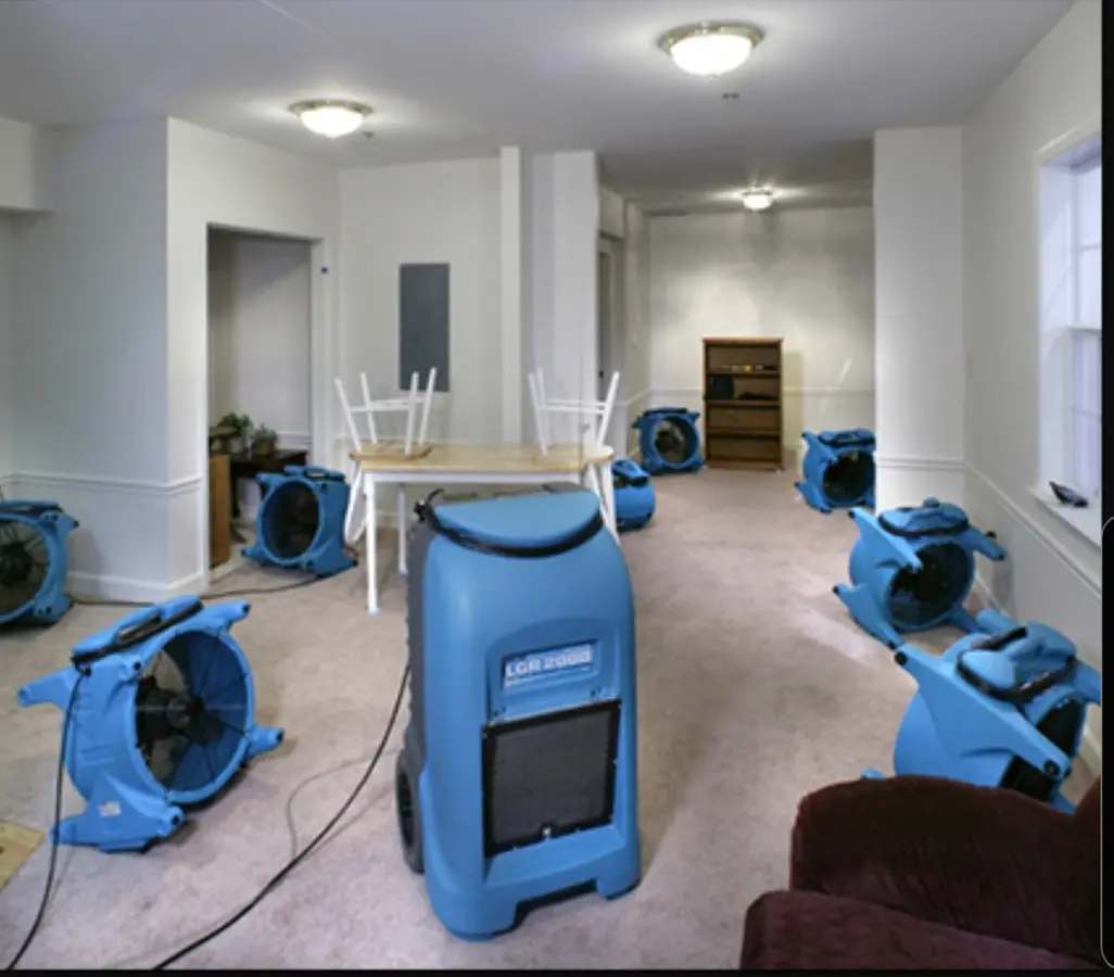 Air movers and dehumidifier setup for Water Damage Restoration in Jarrell